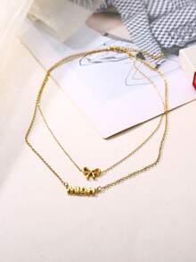 Collier en acier inoxydable personnalisé à double couche avec nœud papillon minimaliste et mignon. Nouveau collier bohème créatif avec nœud papillon. Parfait pour l'anniversaire, le mariage, l'anniversaire, la remise des diplômes, la fête des mères, la Saint-Valentin, le port quotidien. Collier de mode personnalisé avec texte pour l'anniversaire, la remise des diplômes, la fête