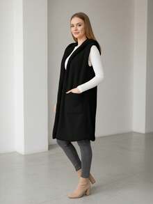 Chaleco largo informal con capucha para mujer con bolsillos delanteros, tejido elástico medio para un estilo cotidiano. - Negro - Ver 2