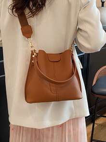 Nueva bolsa de hombro de moda para mujer, bolso cubo minimalista de unicolor de PU, bolso versátil y elegante de estilo retro de alta gama, adecuado para citas y compras