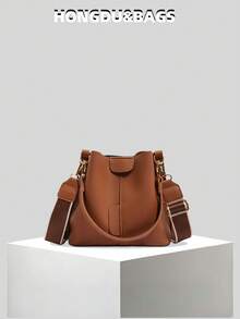 Nueva bolsa de hombro de moda para mujer, bolso cubo minimalista de unicolor de PU, bolso versátil y elegante de estilo retro de alta gama, adecuado para citas y compras