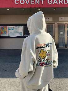 女士休闲宽松印花卫衣，舒适百搭，适合秋冬季穿着。