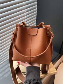 Nueva bolsa de hombro de moda para mujer, bolso cubo minimalista de unicolor de PU, bolso versátil y elegante de estilo retro de alta gama, adecuado para citas y compras