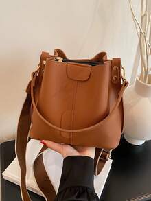 Nueva bolsa de hombro de moda para mujer, bolso cubo minimalista de unicolor de PU, bolso versátil y elegante de estilo retro de alta gama, adecuado para citas y compras