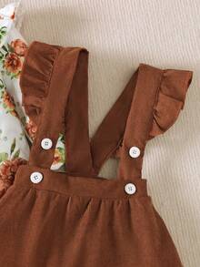 BrownBark 3件套女婴优雅可爱家居服套装，包括舒适圆领荷叶袖碎花连体衣、纯色背带裙和发带，适合春秋季、休闲、校园、户外、街头风格、居家穿着。 - 棕色 - 查看 7