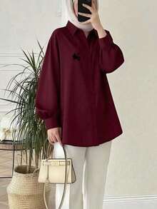 女士常规长度梭织面料纽扣细节长袖衬衫