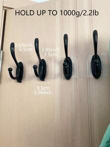 Selbstklebende Kunststoff-Wandhaken, schwarze nahtlose Haken für Badezimmer, Schlafzimmer, schwarze Wandhaken zum Aufhängen, Metall-Kleiderhaken, wandmontierte Cubicle-Zubehörteile, Retro-Doppelhaken, schwere Türhänger für Handtücher, Hüte, Schlüssel, Schrank, Tasche