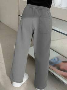 Pantalon de mezclilla para niña con corte recto y acabado deslavado en tono negro - Negro - Ver 2