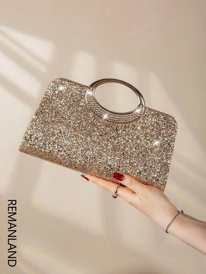 REMANLAND 这款闪耀夺目、优雅迷人的单颗水晶点缀时尚金属手拿包，是女士出席派对、婚礼、盛会及其他场合的理想之选。这款晚宴包是派对女孩和女士的完美之选，也是馈赠女性的绝佳礼物，更是一款完美的舞会包。