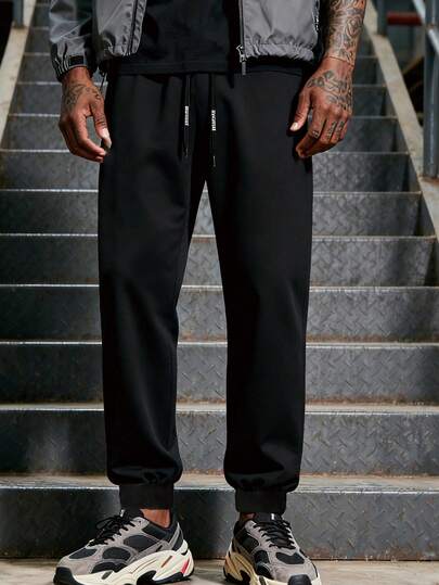 Warme, thermisch gevoerde broek, effen kleur, gebreide stof, losse pasvorm, bedrukt trekkoord, comfortabele dikke lange broek geschikt voor het koude seizoen