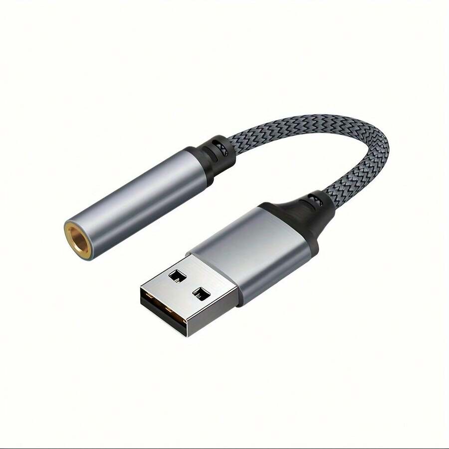 USB声卡转3.5mm音频耳机适配器，外置声卡，适用于电脑、PC，支持麦克风、耳机等音频连接。这款音频适配器采用USB转3.5mm耳机接口，兼容大多数USB接口，并带有3.5mm音频辅助线。