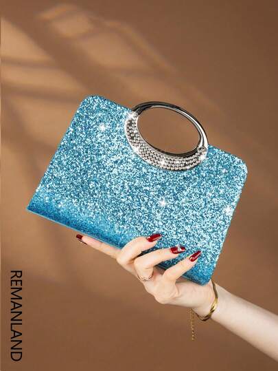 REMANLAND 这款闪耀夺目、优雅迷人的单颗水晶点缀时尚金属手拿包/晚宴包，适合女士出席派对、婚礼、盛会及其他场合。这款晚宴包是派对女孩和女士的理想之选，也是馈赠女性的完美礼物。