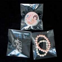 50/100个，大号自封玻璃纸袋，自粘式，透明可重复密封玻璃纸塑料袋，用于包装衣服、T恤、裤子、饰品等。 - 彩色 - 查看 7