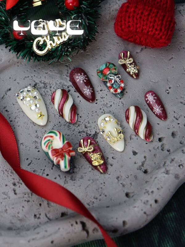 10 piezas de uñas navideñas hechas a mano con almendra, estilo europeo ojo de gato rojo y blanco, estilo navideño con cascabel dorado y lazo, decoración de árbol de Navidad con rhinestone, caramelo con forma de paraguas, set de uñas postizas de cobertura total con copos de nieve dorados y blancos estilo Y2K para niñas y mujeres con 1 lima de uñas mini y 1 hoja de pegatinas adhesivas