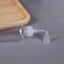 1/2/3/4/5个透明塑料尖口瓶，10/50/100毫升液体灌装瓶，爽肤水灌装滴管瓶，颜料挤压瓶，药品挤压瓶，旅行灌装瓶，透明塑料迷你空瓶，带尖口挤压滴管瓶，防漏旅行瓶套装，便携式可重复灌装挤压容器，适用于洗发水、乳液、洗漱用品旅行瓶套装，可重复灌装挤压容器，挤压瓶空液体分配器，尖口容器，适用于化妆品和洗漱用品 - 白色 - 查看 4