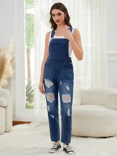 Femmes Salopette en jean ajustée à la taille moyenne, lavée et déchirée