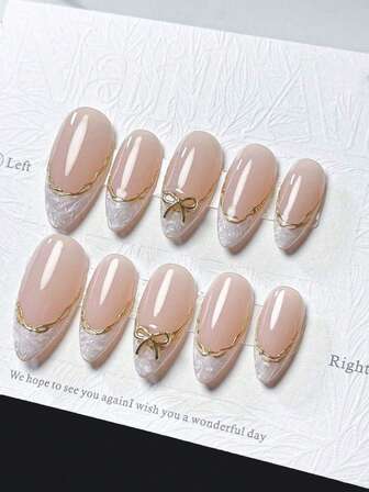 10 Pieces Of Handcrafted Press-On Short Nails Featuring French Tips. This Artificial Nail Set Includes Designs In White, Pink, Gold, Blue, And Yellow, With An Adorable Aesthetic. Each Nail Is Adorned With Hand-Painted Vine Motifs Winding Along Metallic French Edges, And Embellished With Golden And Diamond Bow Accessories