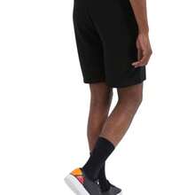 Bermuda Molla Loopback Ellesse For Men In Black, Ideal For An Urban And Sporty Style. Made Of Soft And Lightweight Cotton, It Offers Comfort And Freedom Of Movement. Its Modern Design Includes An Adjustable Elastic Waist And The Characteristic Ellesse Logo. Perfect For Casual And Relaxed Looks. - Black - View 2