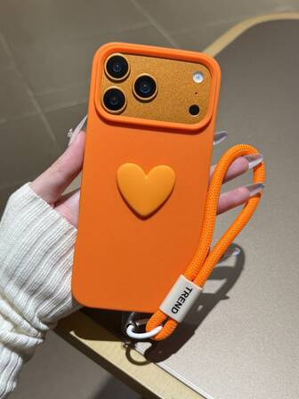 1个哑光半透明橙色手机壳，饰有简约纯色3D爱心图案 + 1条尼龙手机挂绳，适合作为礼物送给亲朋好友，适用于 17 Pro Max、16 Pro、15 Pro Max、14、13、12、11英寸机型。