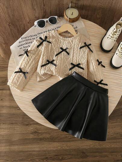 2pcs/Set Girls' Solid Color Bow Hollow Long Sleeve Top And Black PU Leather Skirt Set, Sweet Vacation Cute Fashion Knit Top And Mini Skirt Outfit, Suitable For Outdoor, Party, Gift, Spring/Autumn