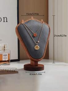 1 قطعة رف مجوهرات أنيق من الجوز، تصميم عصري لعرض العقود والقلائد، ملمس فخم وجودة عالية، مثالي لتزيين غرفة النوم أو صالة العرض، متوفر بألوان متعددة تناسب جميع الأذواق، هدية مثالية في المناسبات الخاصة مثل عيد الميلاد أو حفلات الزفاف، يضيف لمسة جمالية وعملية لتنظيم المجوهرات بشكل أنيق. - متعدد الألوان - مشاهدة 20