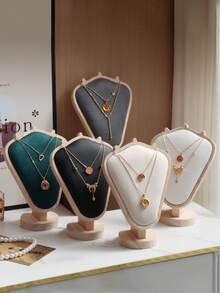 1 قطعة رف مجوهرات أنيق من الجوز، تصميم عصري لعرض العقود والقلائد، ملمس فخم وجودة عالية، مثالي لتزيين غرفة النوم أو صالة العرض، متوفر بألوان متعددة تناسب جميع الأذواق، هدية مثالية في المناسبات الخاصة مثل عيد الميلاد أو حفلات الزفاف، يضيف لمسة جمالية وعملية لتنظيم المجوهرات بشكل أنيق. - متعدد الألوان - مشاهدة 9