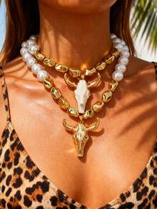 This Punk Western-Style Multi-Color Alloy Bull Head Faux Pearl Asymmetric Beaded Cherry Bead Necklace Is Designed For Women, Suitable For Outdoor Adventures, Shopping, And Daily Wear. This Eye-Catching, Distinctive Gold Accessory Is An Excellent Birthday Gift For Friends.