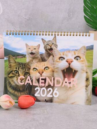 1 pieza Nuevo calendario de gatitos 2026. Regalo de Navidad, Año Nuevo y cumpleaños. Decoración colgante de pared, fotos de gatos divertidas e interesantes, gran regalo para amantes de los gatos. Se puede colocar en la oficina, la sala de estar o el dormitorio. Decoración del hogar, papel de alta calidad. Se puede usar para escribir, diario y planificador.