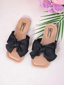 1 par de sandalias abiertas cómodas y antideslizantes con decoración de lazo minimalista, adecuadas para uso en verano, color negro + para niñas