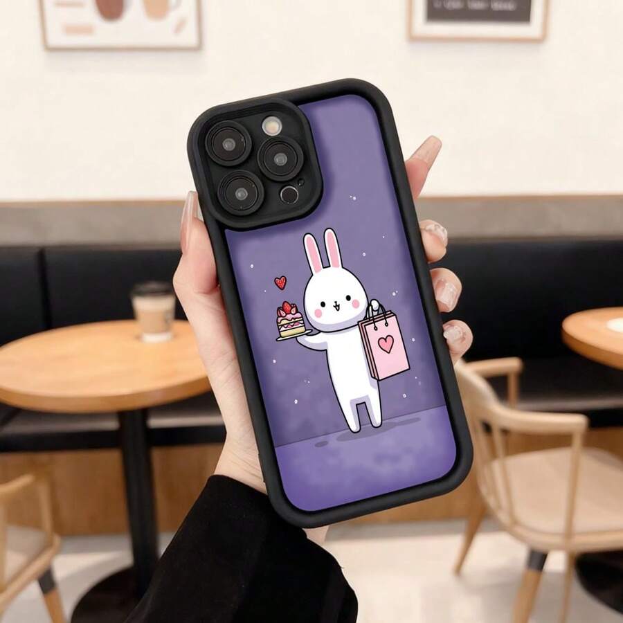 Phone Case With Black Border And Design Of A White Rabbit Holding A Cake And Shopping Bag On A Purple Background For Daily Use In Cafes And Casual Spaces Suitable For Apple Series Phones - White - View 1