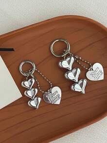 1个可扩展心形卡包钥匙扣，配有黑白心形吊坠，经久耐用，时尚设计，适合女性。可爱实用的塑料钥匙扣，校园必备，时尚钥匙扣配有金属心形吊坠，可收纳身份证、信用卡、交通卡和钥匙。 - 彩色 - 查看 10