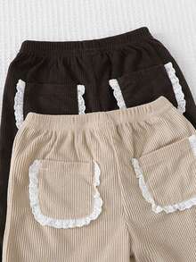 مجموعة بنطلونين للأطفال البنات مريحة بتصميم لون أحادي مع تريم كشكش وجيب فريد من نوعه من القطيفة مناسبة لجميع الفصول - متعدد الألوان - مشاهدة 5