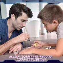 1pc Inspired Stainless Steel Movie Spinning Top For Stress Relief And Entertainment