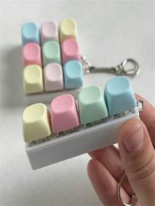 1 pieza Llavero de tecla de teclado para alivio del estrés - Un juguete para los dedos con efectos de sonido para aliviar eficazmente el estrés, con colores macaron vibrantes. La apariencia, el color y el diseño son muy atractivos, lo que lo convierte en un obsequio o recuerdo de fiesta perfecto para amigos y familiares (entrega de color aleatorio). - Multicolor - Ver 6