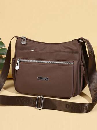 1 st damväska med flera lager och stor kapacitet, stänkskyddande nylonaxelväska för kvinnor, avslappnad mobiltelefonväska. Lämplig för shopping, plånbok, shopping, unga kvinnor, högskolestudenter, nykomlingar, tjänstemän. Mycket lämplig för kontor, högskola, arbete, affärer, pendling, utomhusaktiviteter, resor och utflykter.