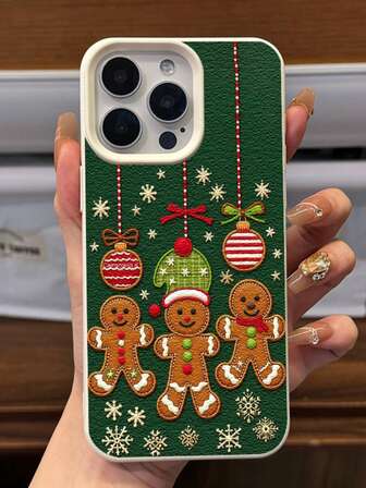 1个圣诞绿色背景姜饼人图案手机壳，皮革质感TPU软壳，全覆盖摄像头保护，兼容 XR、11、12 Pro、13 Pro、14、15 Plus、15 Pro Max、16、17 Air、Pro Max系列，适合作为圣诞礼物送给亲朋好友。