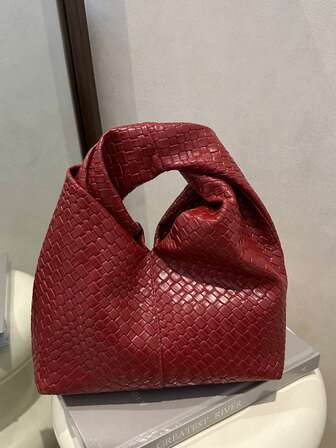 Modern och mångsidig texturerad enfärgad ny PU-axelväska, avslappnad och enkel texturerad fransk pinne-väska, damväska