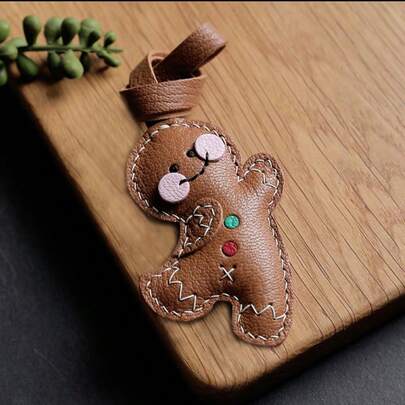 حقيبة مفاتيح جميلة وأنيقة من الجلد الصناعي البني على شكل رغيف الزنجبيل مصنوعة يدويًا، قلادة لحقيبة اليد أو الظهر، هدية عيد ميلاد مناسبة للأخ/الأخت/الأم/الأب/الصديق المقرب/الصديقة/الصديق