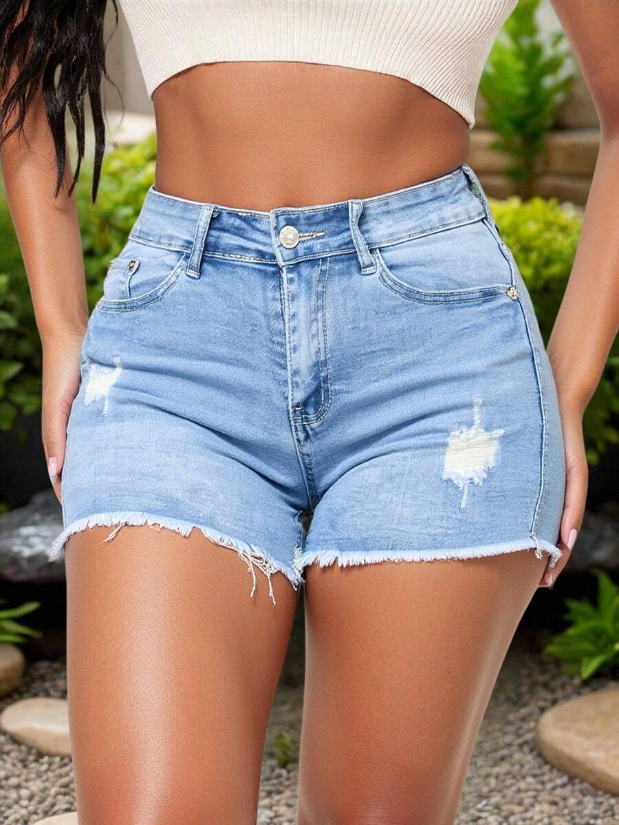 Pantalones cortos de mezclilla azul claro de tiro alto, con roturas y bordes desfilachados, tejido suave y elástico, casuales, modernos y versátiles. - Lavado ligero - Ver 1