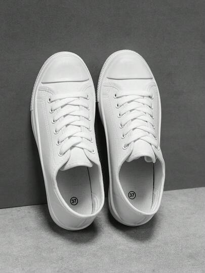 Zapatos de lona casuales para hombres, zapatos de estudiante minimalistas clásicos, zapatillas ligeras y transpirables, diseño de cordones de corte bajo, adecuados para el uso diario, vacaciones y viajes - para todas las estaciones