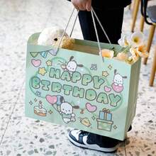 Sanrio 1 PIEZA Bolsa de regalo de papel kraft de gran capacidad con diseño de dibujos animados de Sanrio Katie Cat para decoración de cumpleaños u otras festividades. La bolsa de compras portátil puede presentar una impresión de color ligeramente desigual y unas pequeñas manchas, lo cual es normal en un producto de papel.