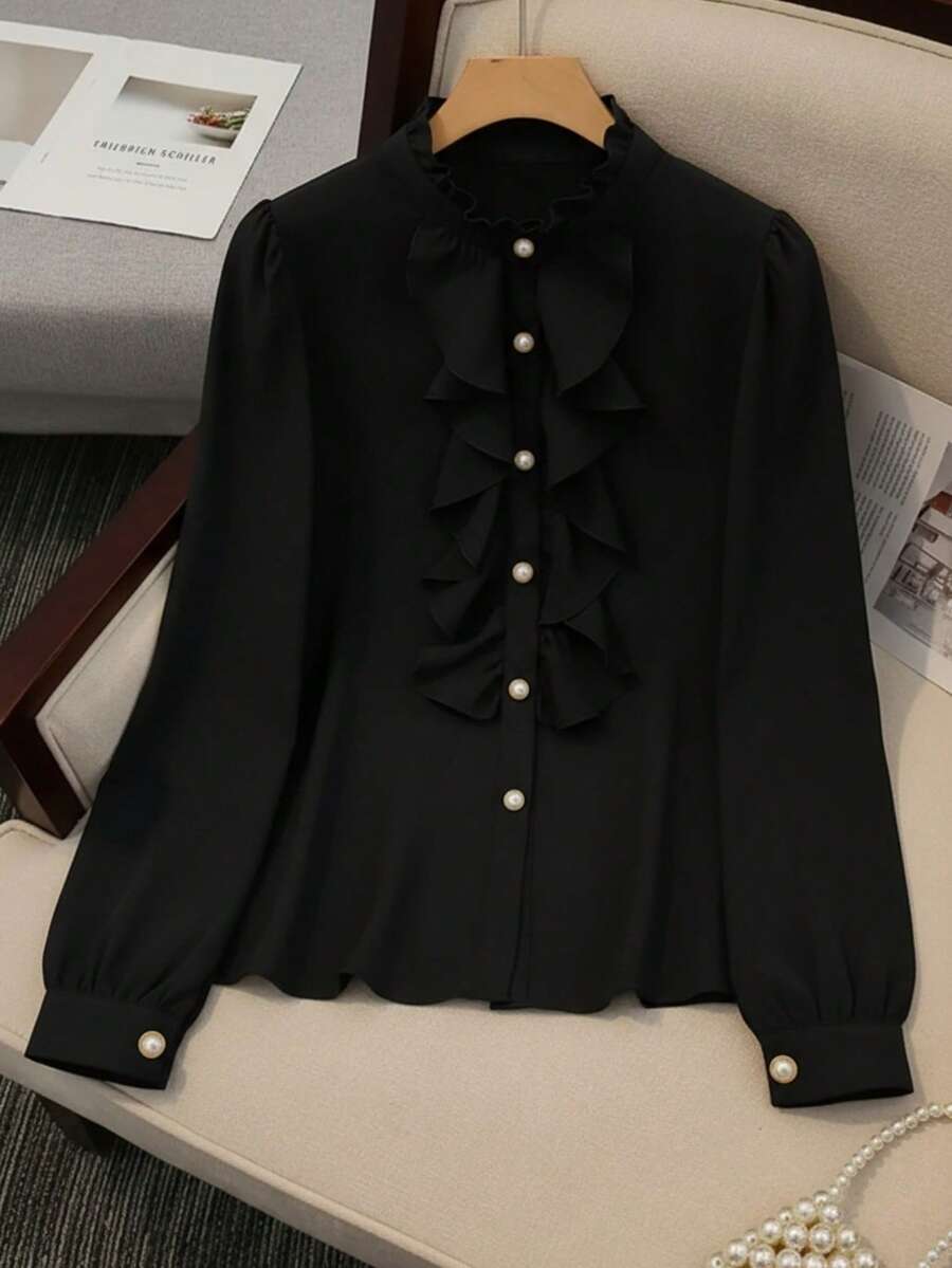 优雅女士黑色荷叶边衬衫，珍珠纽扣，长泡泡袖，立领，涤纶衬衫上衣