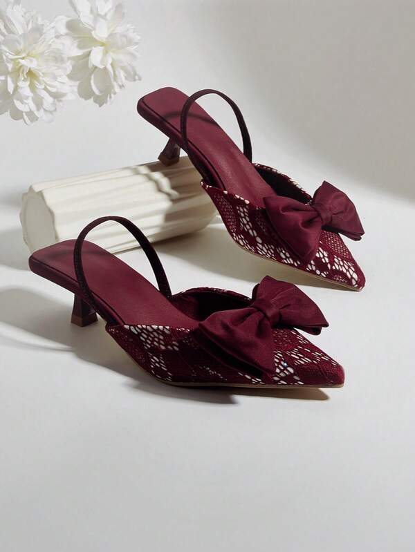 Damskie, nowe, eleganckie, szpiczaste czółenka na obcasie typu kociak z ozdobnymi kokardkami