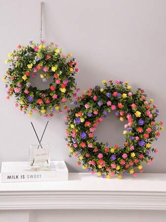Artificial Wreath Featuring Eucalyptus Leaves, Camellias, And Colorful Small Flowers. Available In Two Sizes. Ideal For Valentine's Day Decor. Woven Straw Wreath With Artificial Foliage. Greenery Accents For Year-Round Evergreen Decor. Perfect For Spring And Summer Displays.