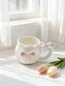 1pc Creative 3D Embossed Hand-Painted Bow Design Ceramic Coffee Mug With Ribbon, Delicate Packaging, Ideal For Gifts
