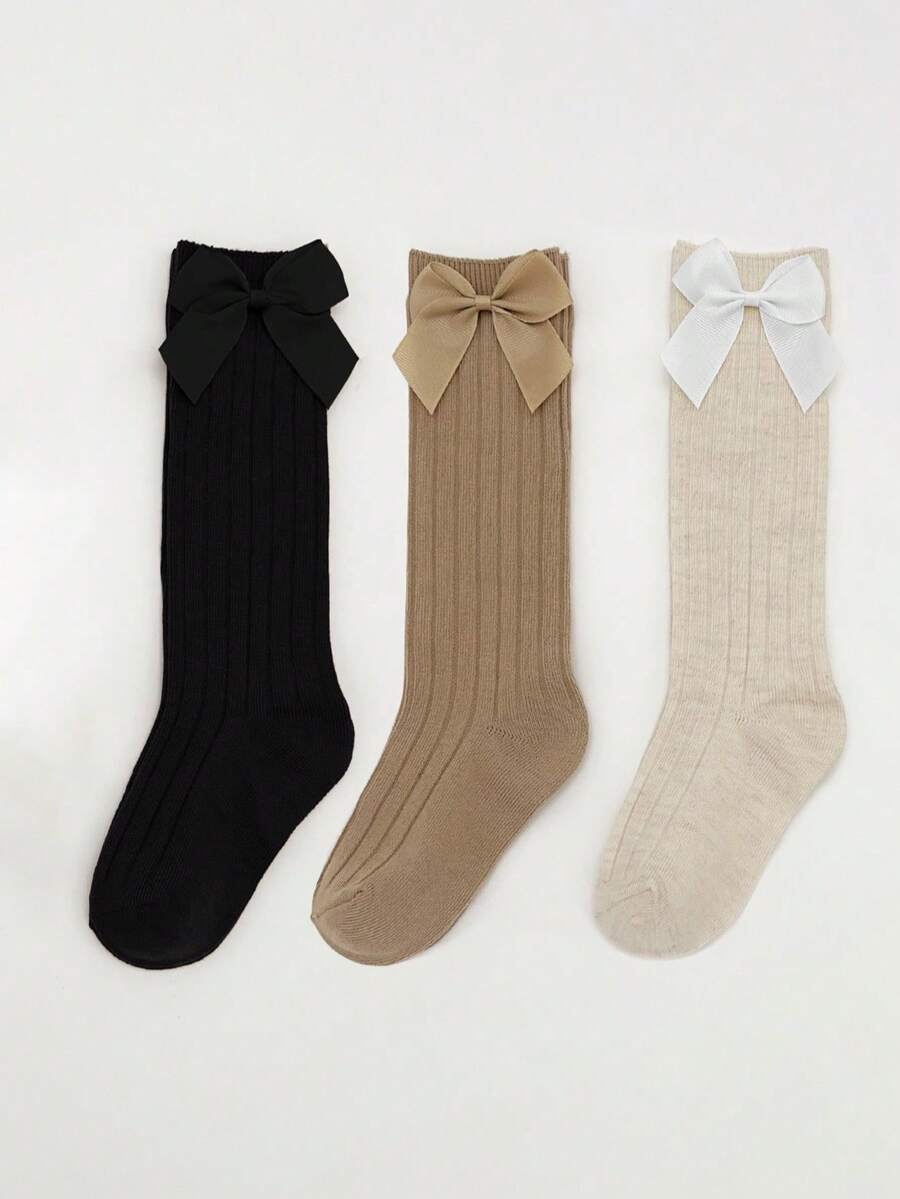 3双女童可爱蝴蝶结纯色过膝袜，适合搭配校服，四季皆宜，春秋季均可穿着。