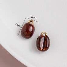 5件套巴黎早餐咖啡系列合金吊坠，包括咖啡豆、羊角面包、巧克力棒、布丁、甜甜圈、茶壶、杯子和餐具等造型，适合DIY项链、手链、耳环、钥匙扣等饰品制作。 - 彩色 - 查看 7