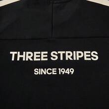 Sudadera deportiva unisex de tres rayas de Adidas, color negro, con cuello redondo. - Negro - Ver 5