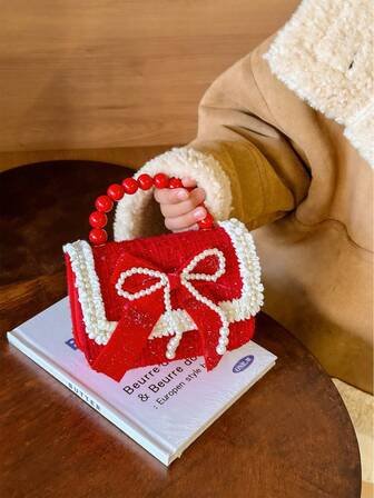 可爱珍珠蝴蝶结手提包，翻盖斜挎小包