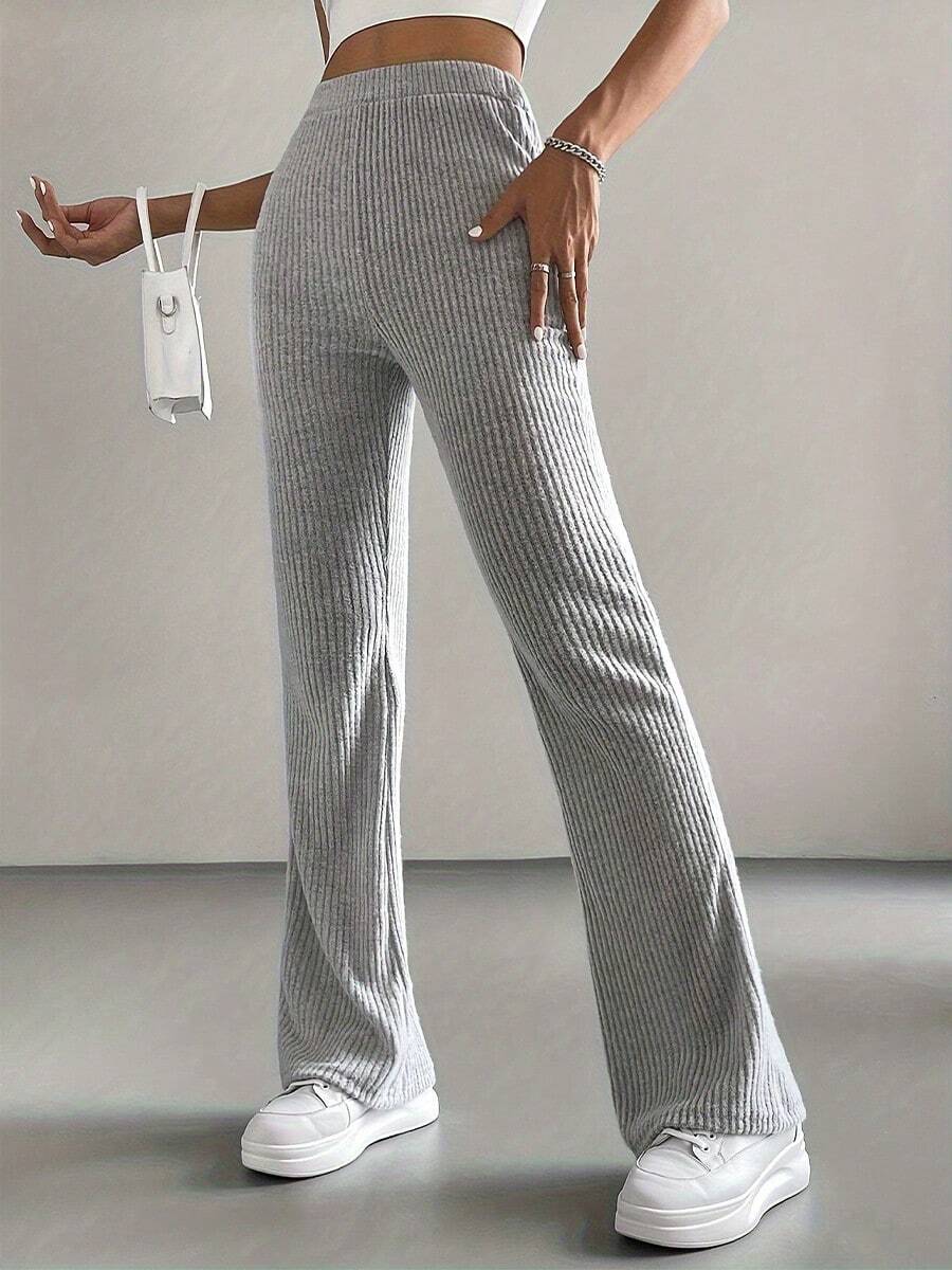 Novedades en moda femenina: pantalones casuales elásticos de cintura alta, sencillos, de color liso, con ribetes y corte ajustado, ligeramente acampanados, nuevo estilo para primavera/otoño, pantalones acampanados, pantalones casuales de color liso para mujer, de punto acanalado, pantalones ajustados versátiles y a la moda. - Gris - Ver 1