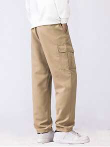 男士休闲工装裤，宽松直筒版型，垂感好，适合居家休闲和户外活动，也是情侣送礼佳品。采用100%涤纶面料，配有抽绳腰带，可调节松紧，多种颜色可选。